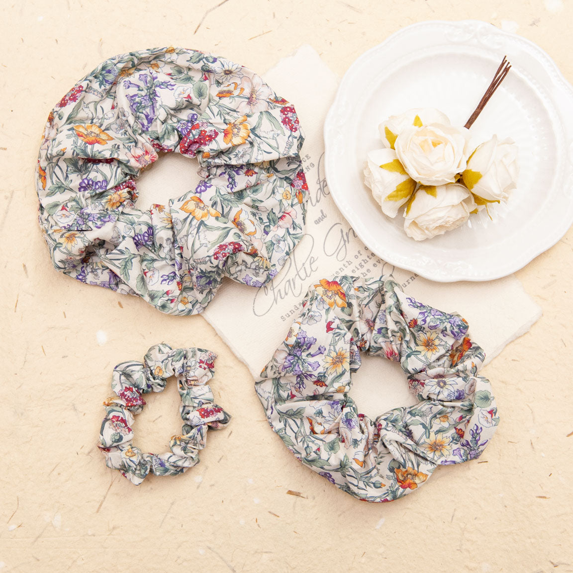 liberty fabric scrunchies in field flowers in 3 different sizes