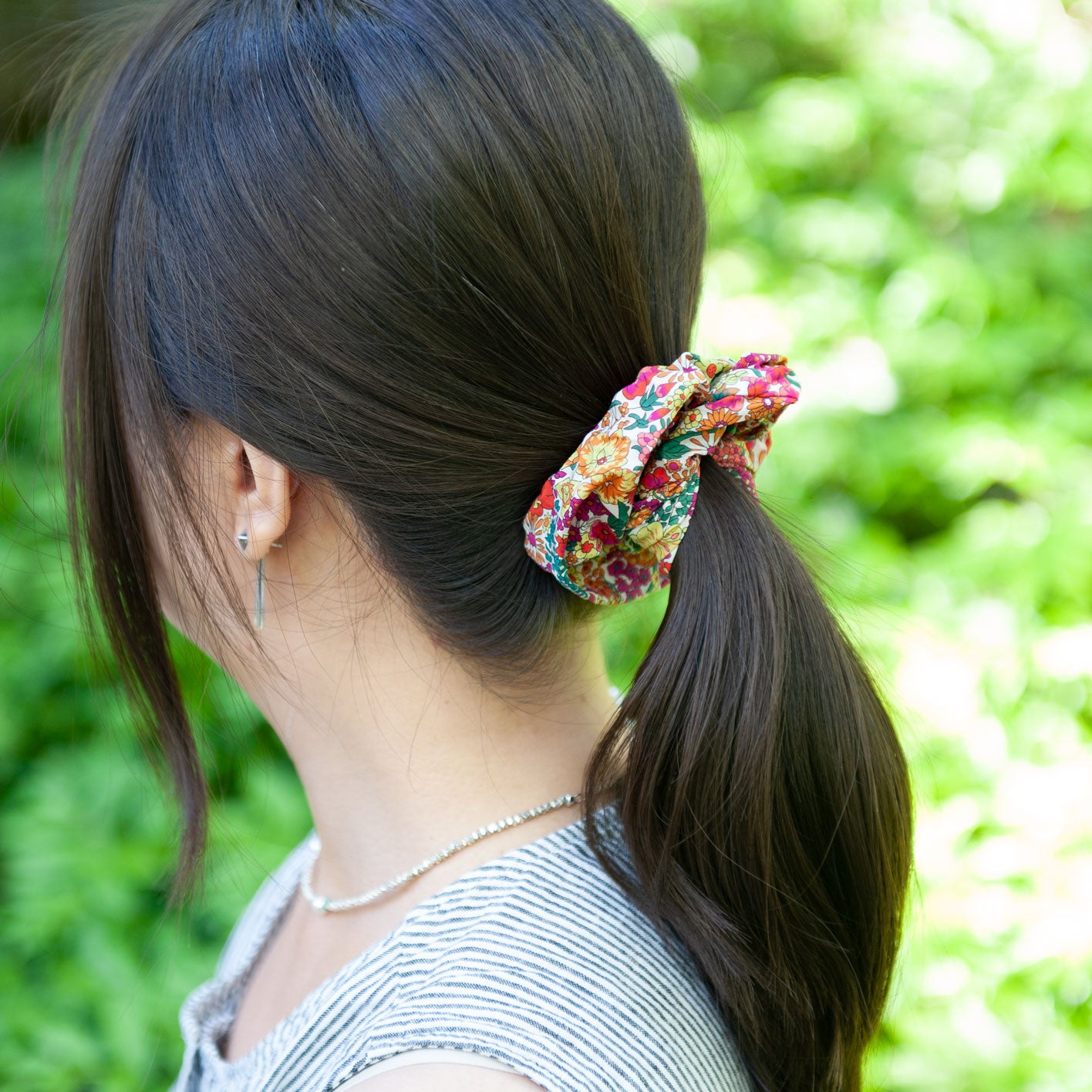 a woman wearing Liberty Fabric Scrunchie in Margaret Annie in large size