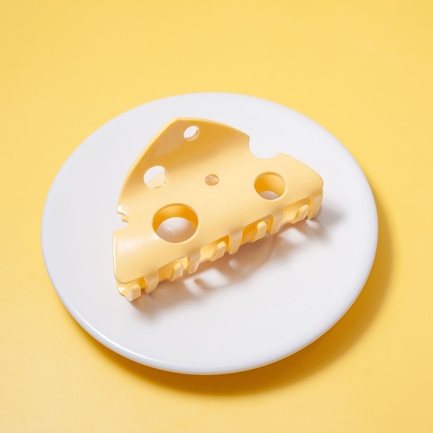 cheese hair clip on a plate