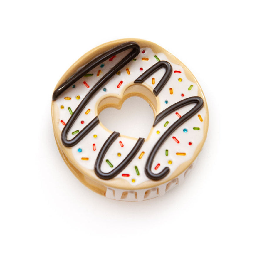 white donut hair claw clip on white background
