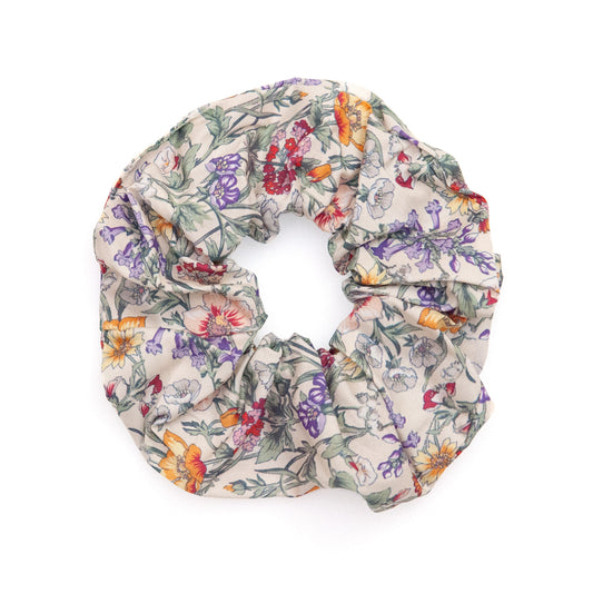 liberty fabric scrunchie in floral print on a white background