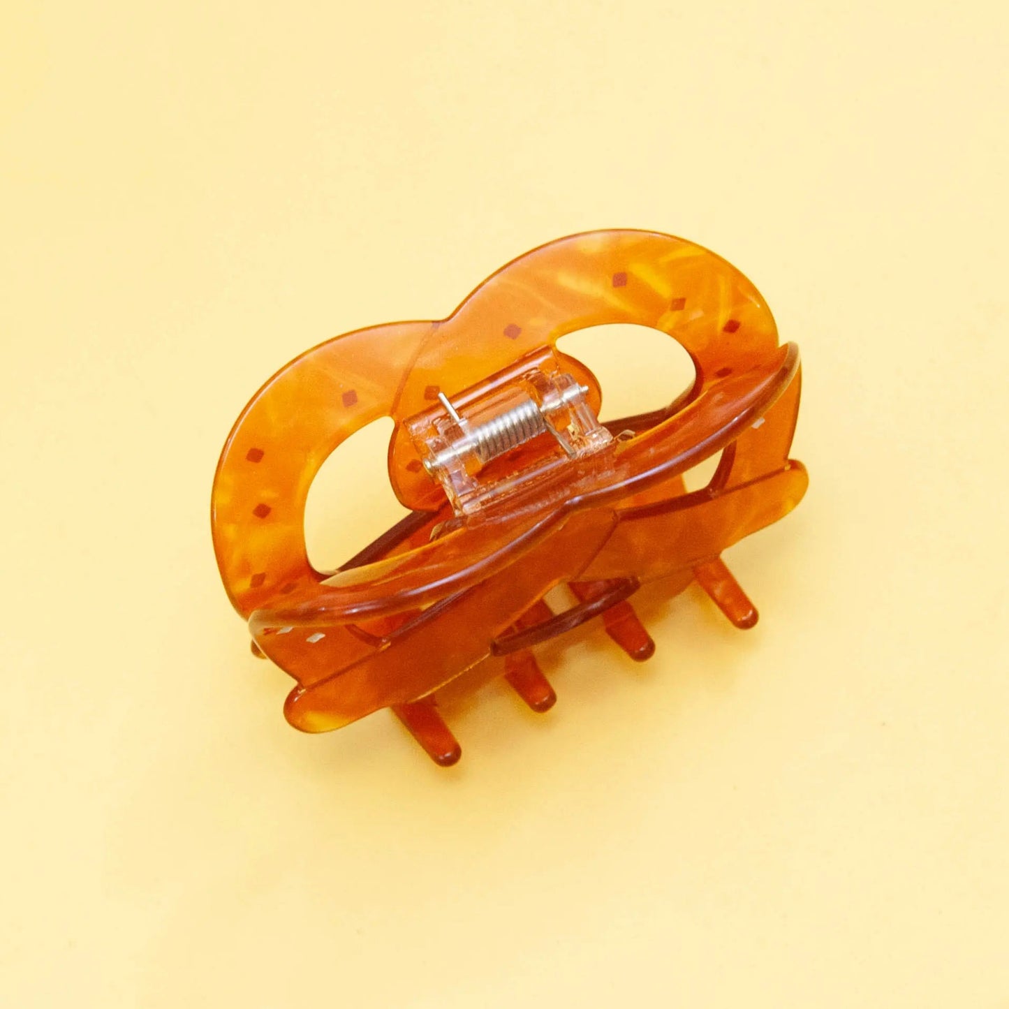 side view of cute pretzel hair clip