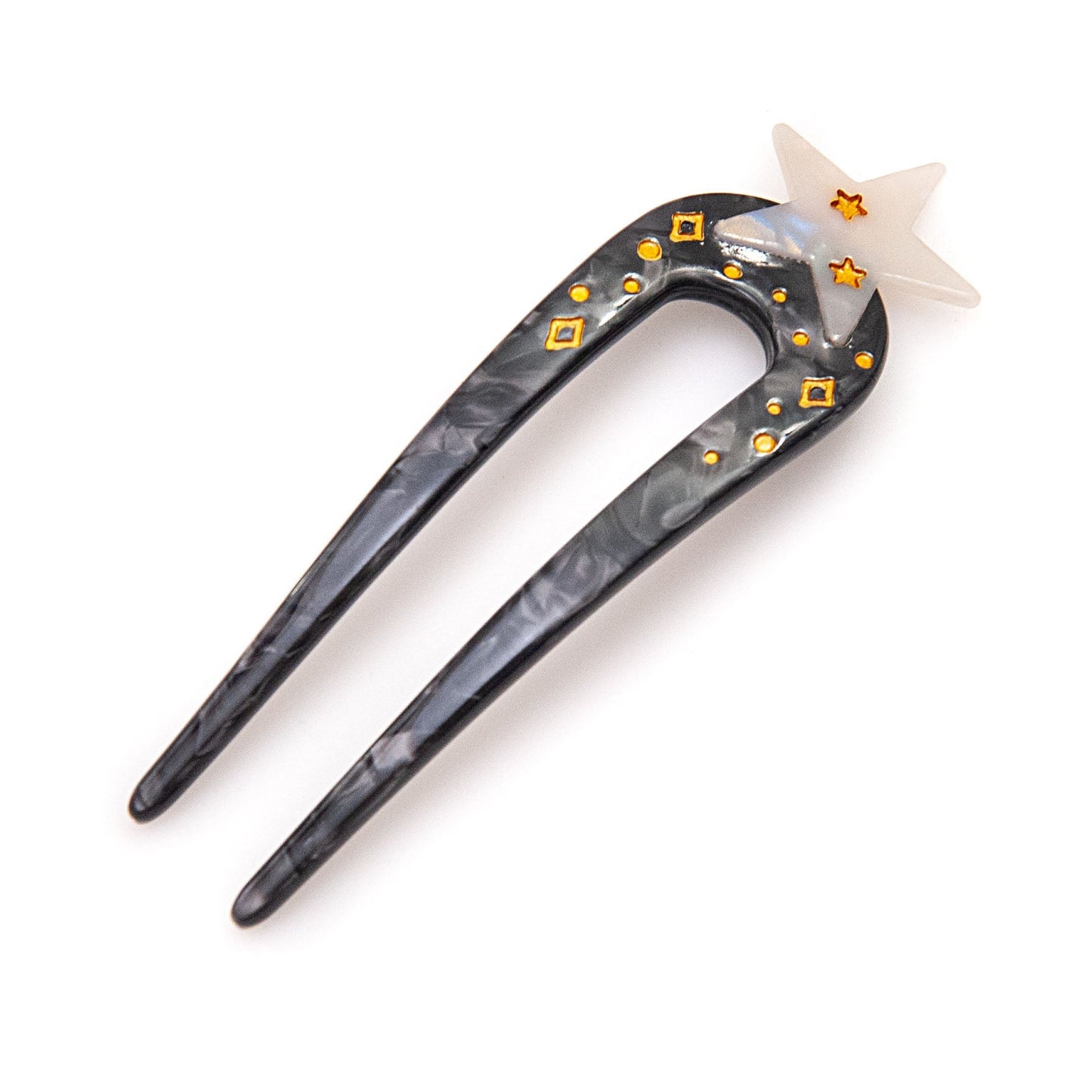 a black acetate hair pin with a white star on top