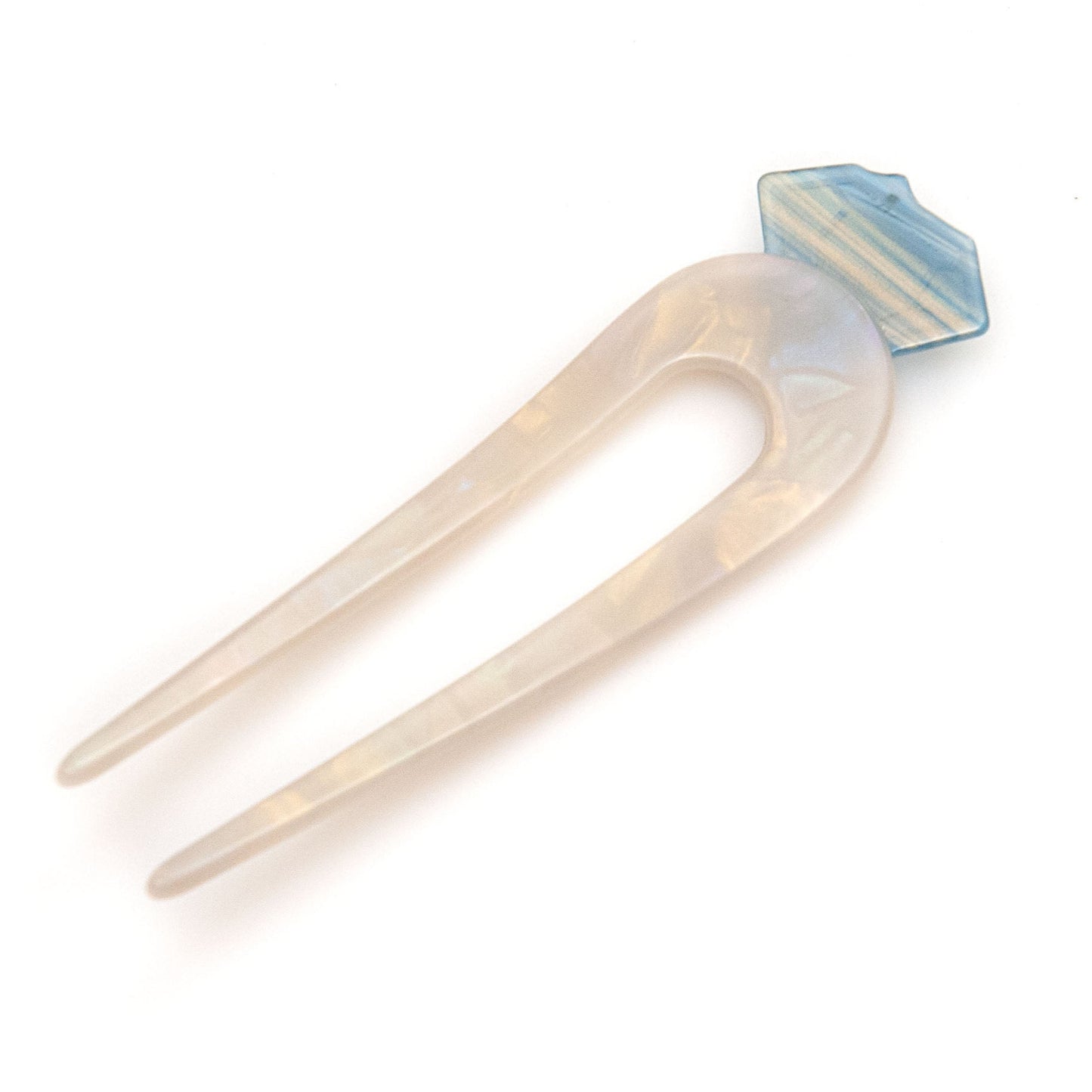 back view of white hair pin