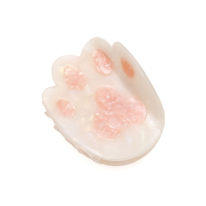 cute cat paw hair clip on a white background