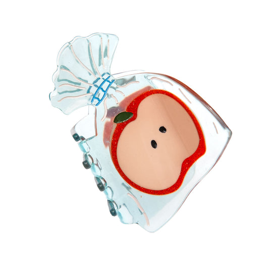 a cute apple hair clip one a white background