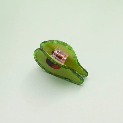 Avocado hair claw with a playful design, perfect for adding a fun and stylish touch to any hairstyle.