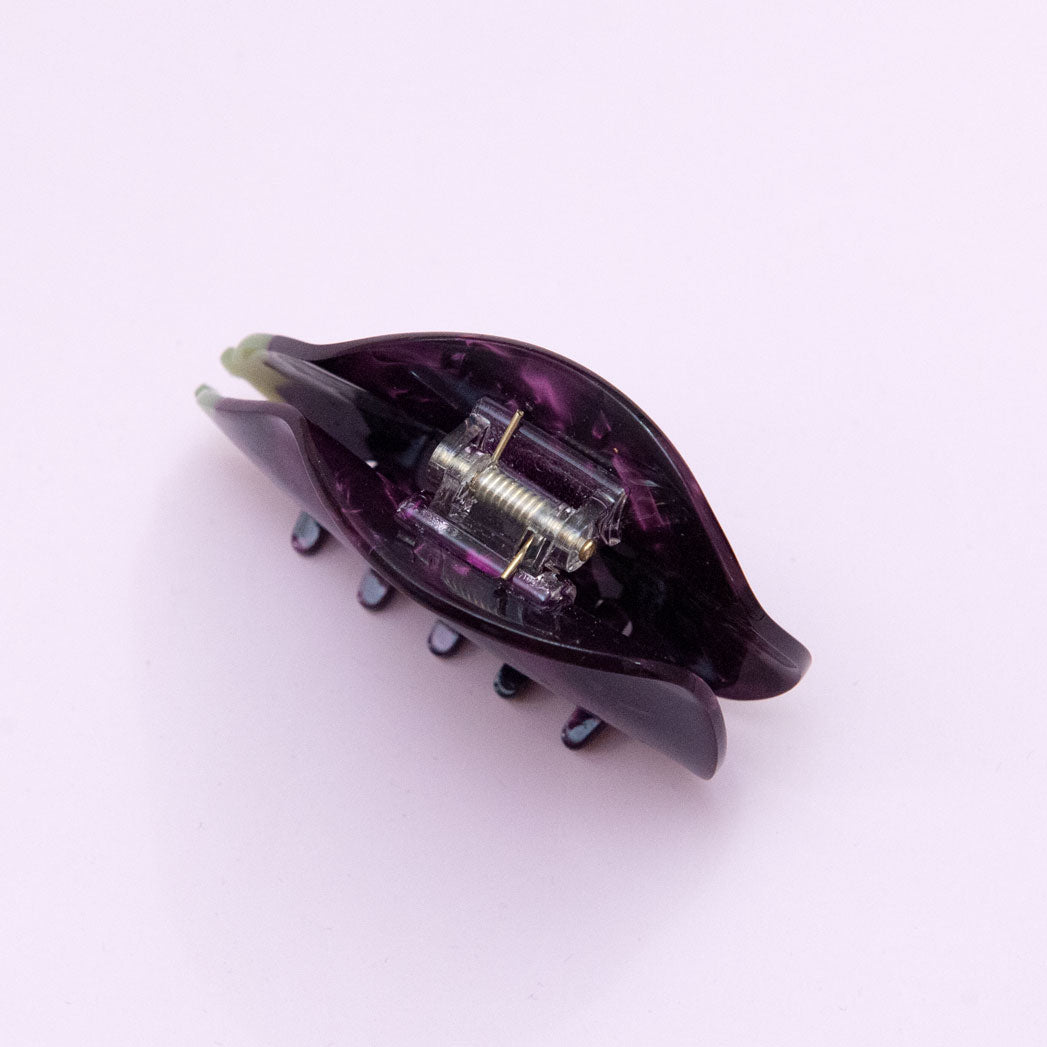 top view of an eggplant hair clip