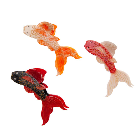 Koi fish claw clips in black, orange, and red with hand-painted details.