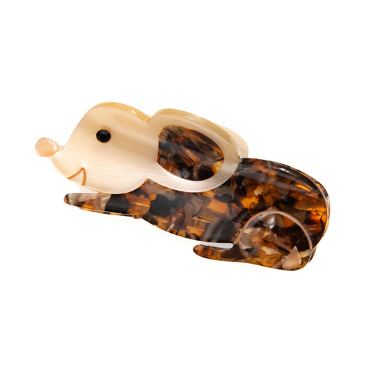 small mouse hair clip on a white background