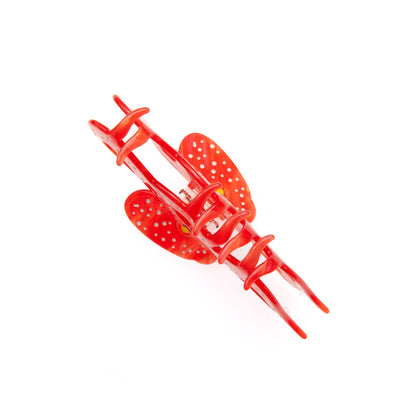 Close-up of the curved teeth on the red octopus claw clip inspired by octopus arms