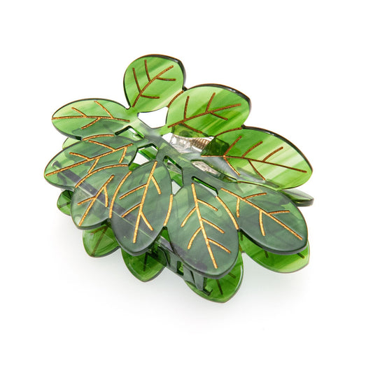 Green leaf-shaped hair clip on a white background
