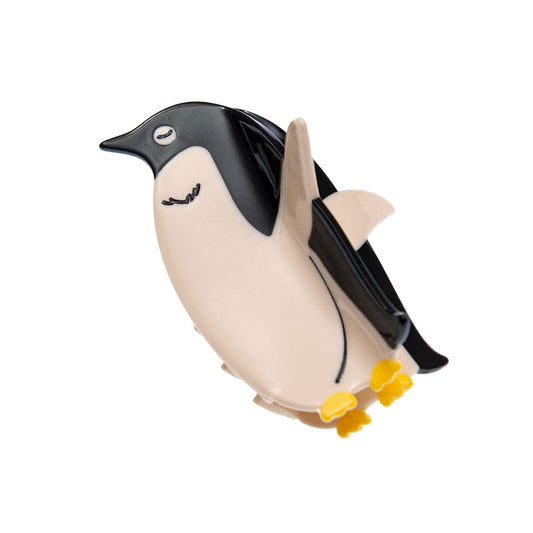 penguin hair claw clip on a white background