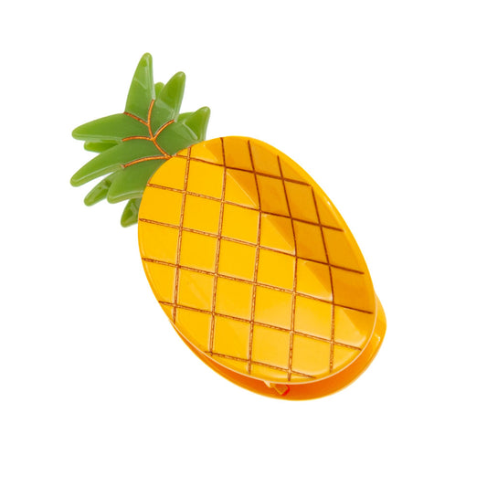 a yellow pineapple hair clip in medium size on a white background