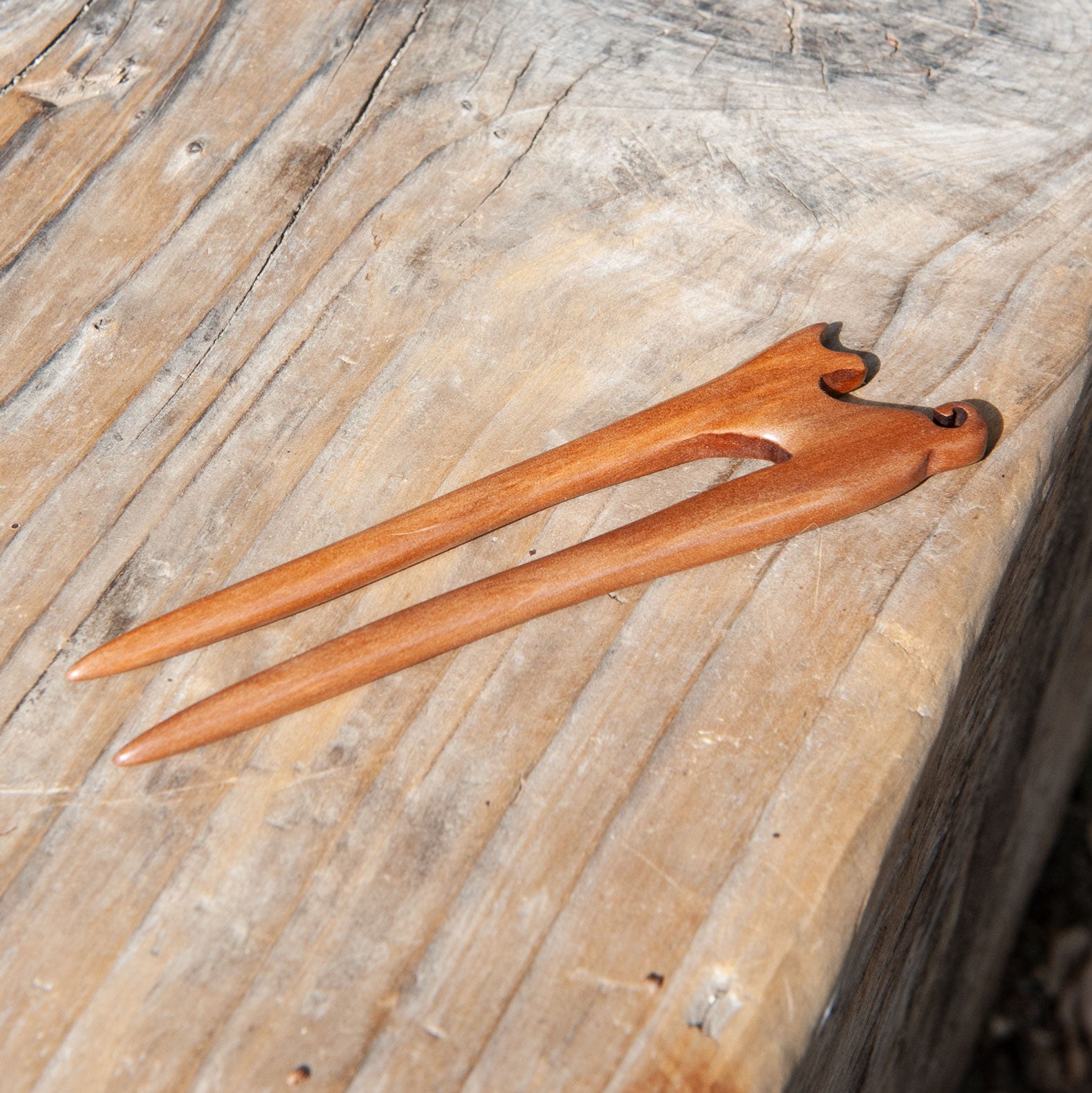 short wooden cat hair pin in peach wood