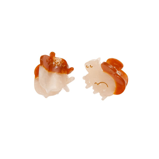 a set of two hair clips including one squirrel clip and one acorn clip