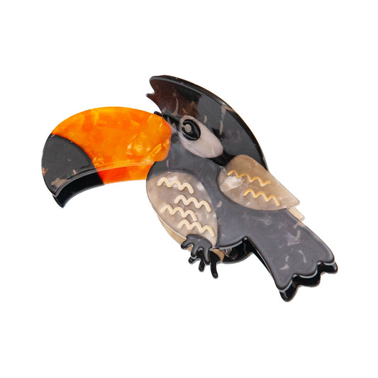 cute toucan hair clip in black on a white background