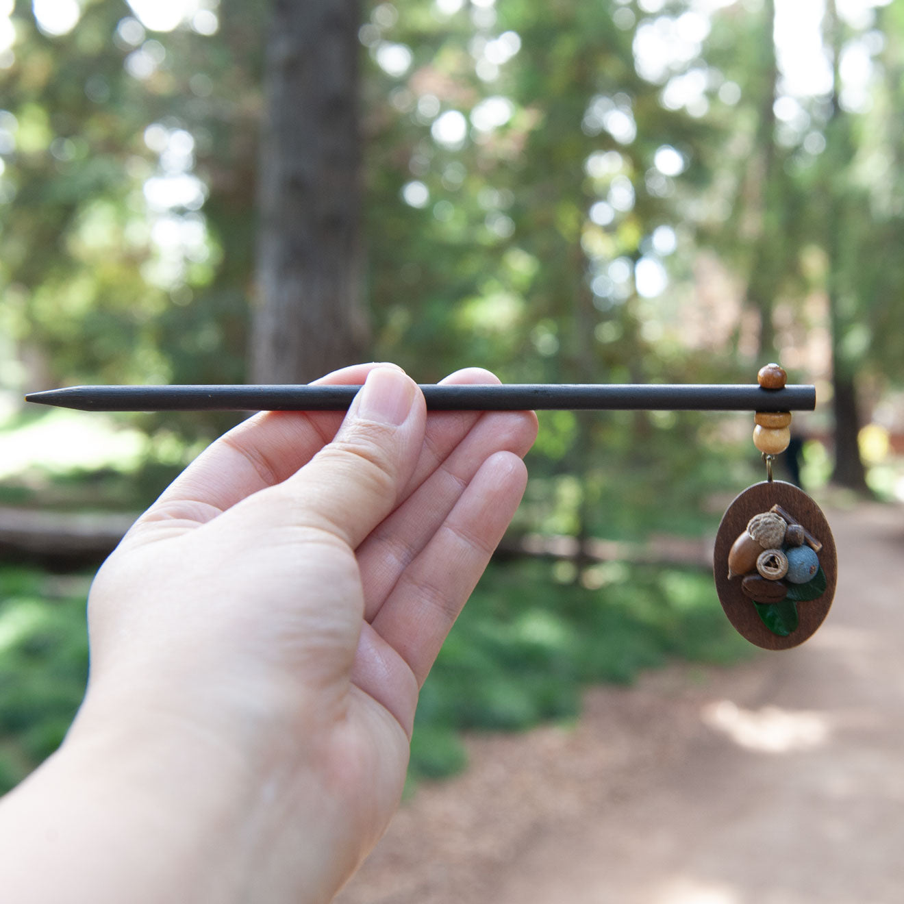 Wooden hair stick with tiny beads, real dried acorns, coffee beans, and blueberries.